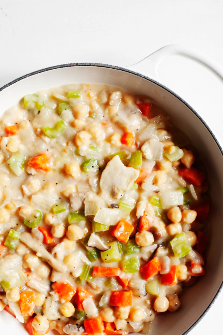 A savory skillet meal with carrots, celery, chickpeas, and a creamy sauce