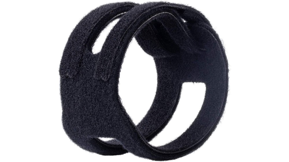 A black wrist brace with two small straps.