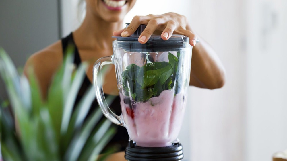 Somone excited to enjoy their delicious nutritious smoothie.