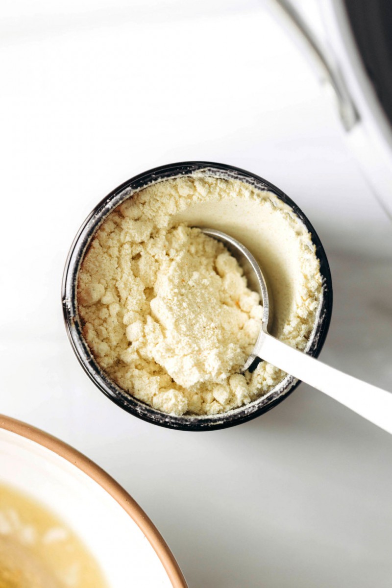 An overhead image of a pale yellow, powdered bouillon base.